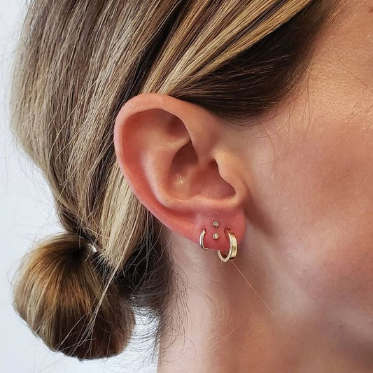 The Rise of Stacked Lobe Piercings - Double Up