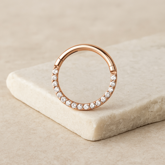 titanium rose gold segment daith ring – hypoallergenic piercing jewellery by Cura