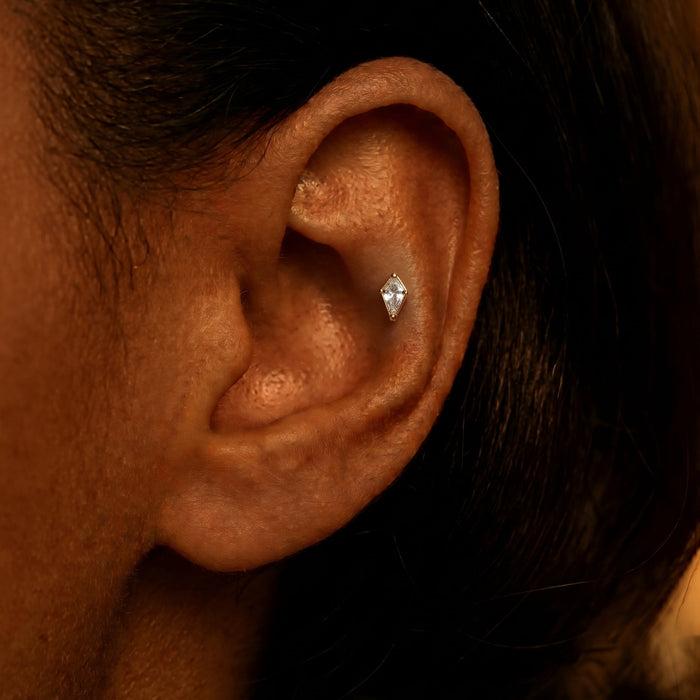 Small Kite earring in Contra conch piercing on models ear